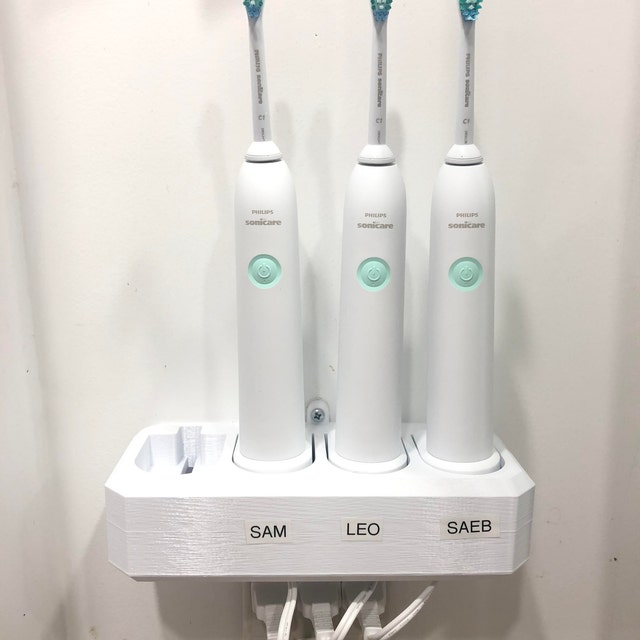 Hoyt Design Electric Toothbrush Holders. Wall mount and countertop